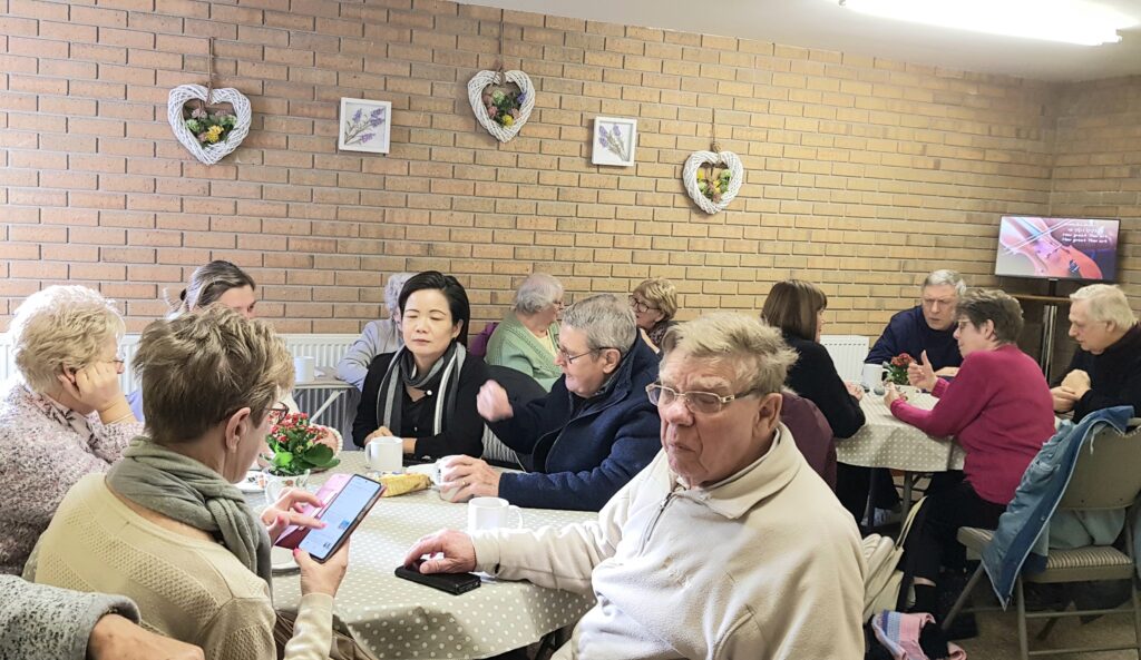 Prayer gathering with community members